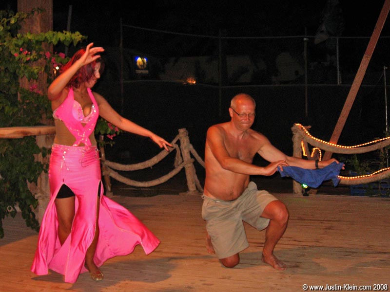 Dance#1: The belly dancer and her new Russian..erm…friend.