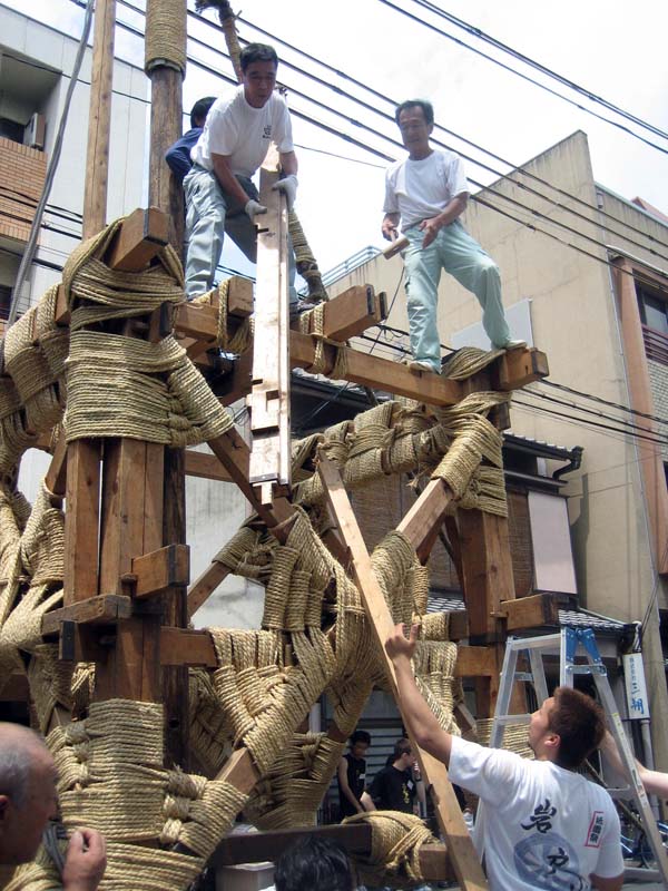 Unfortunately they woudln’t let us climb up to any of the dangerous heights…us uncoordinated gaijin just got to assist from the ground. “Yeah, lookin good up there, Lenny. You keep buildin’!”