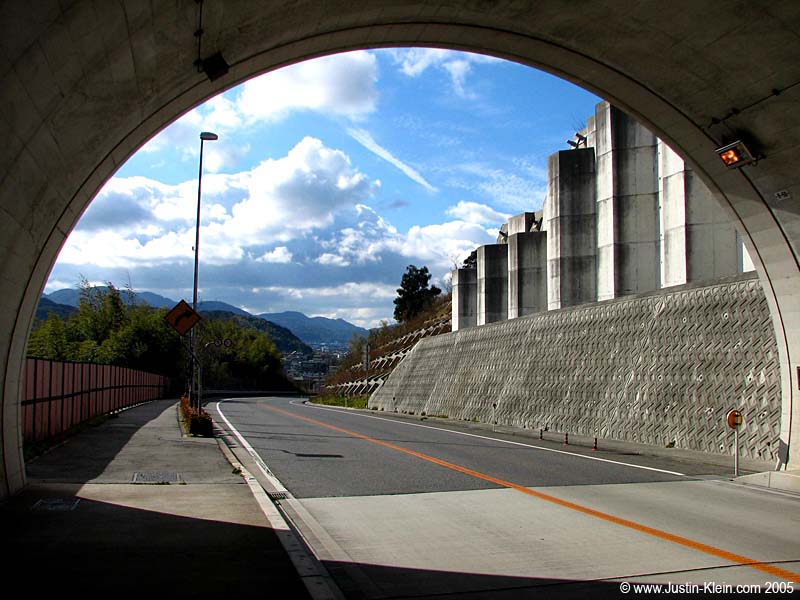 A tunnel! Translation: I can ride THROUGH instead of over this particular mountain. Thank god.