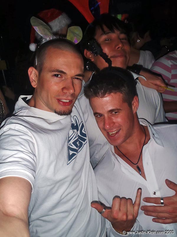 Three guys in antlers.