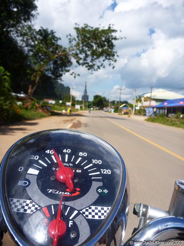 Making my way out of town on Noi’s little scooter.
