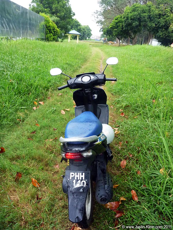 Pulling off the road to change from jeans into boardshorts. With unpredictable showers, soggy wet denim didn’t sound like a particularly fun proposition.